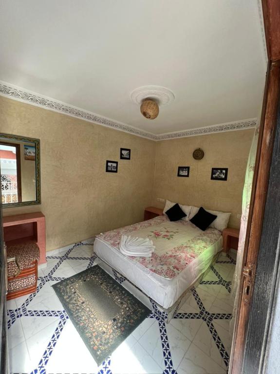 Postel nebo postele na pokoji v ubytování Riad Elijah Marrakech & Spa