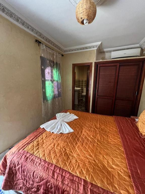 Postel nebo postele na pokoji v ubytování Riad Elijah Marrakech & Spa