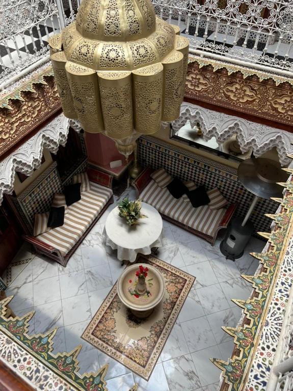 an overhead view of a room with a table in a building at Riad Elijah Marrakech & Spa in Marrakech
