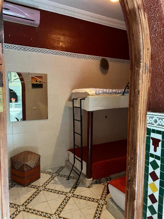 Postel nebo postele na pokoji v ubytování Riad Elijah Marrakech & Spa