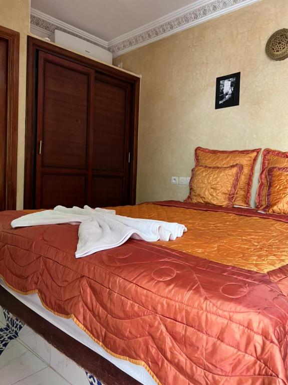 Postel nebo postele na pokoji v ubytování Riad Elijah Marrakech & Spa