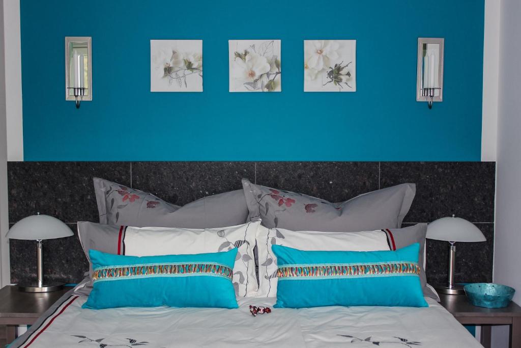Postel nebo postele na pokoji v ubytování Hotel Haus Kallenberg