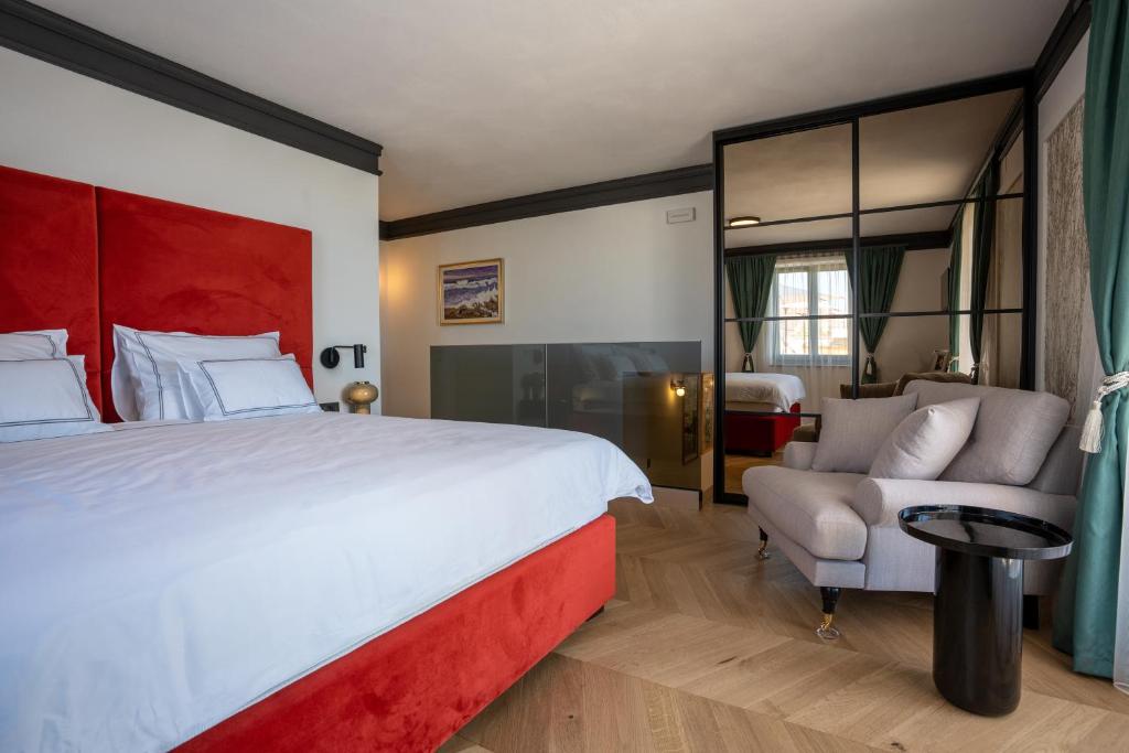 Łóżko lub łóżka w pokoju w obiekcie Restaurant & Villa Morgan