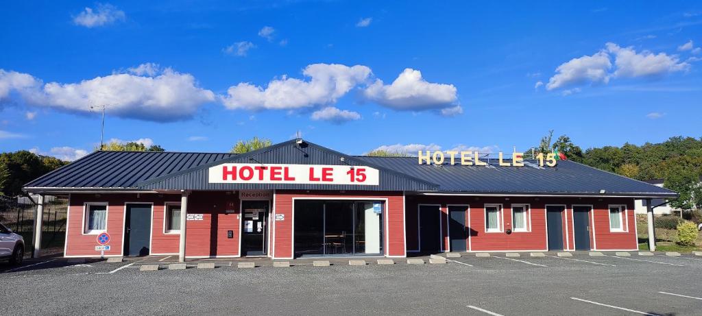 a hotel ielled in a parking lot at Hôtel Le 15 Périgueux in Coulounieix-Chamiers