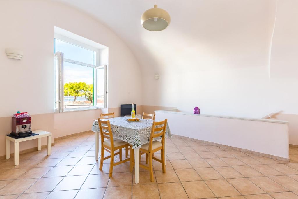 Posezení v ubytování Tizzano House - La Marina