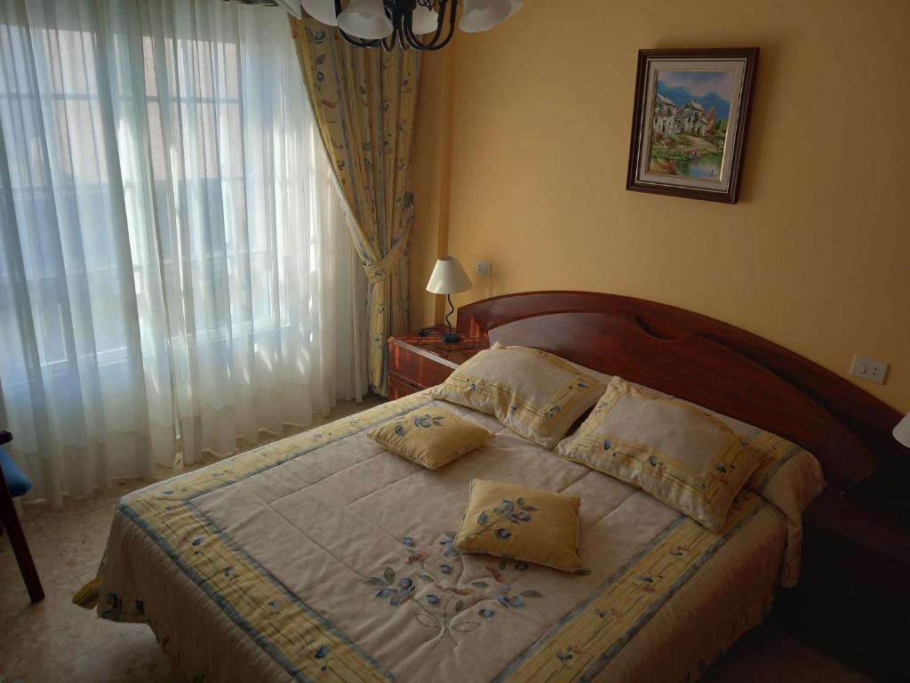 Posteľ alebo postele v izbe v ubytovaní 2º Izq. Piso en O Grove, para Vacaciones y Fines de Semana.