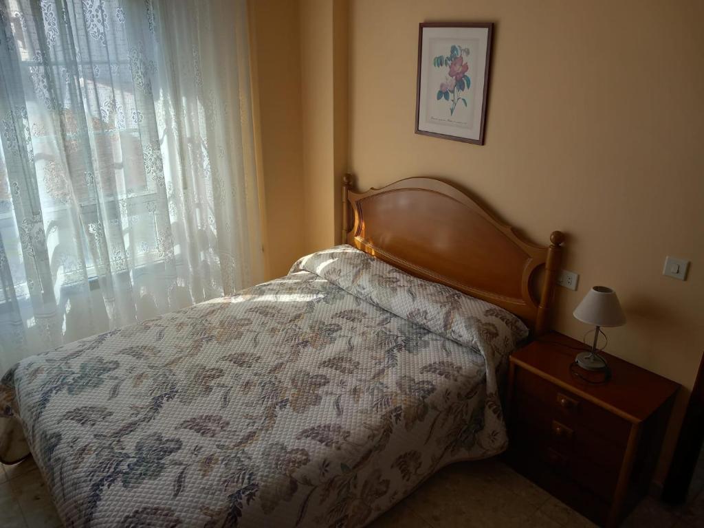 Posteľ alebo postele v izbe v ubytovaní 2º Izq. Piso en O Grove, para Vacaciones y Fines de Semana.