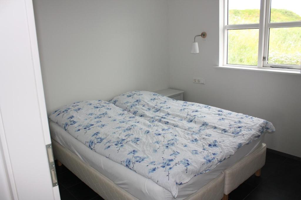 Postel nebo postele na pokoji v ubytování Skútustadir Guesthouse