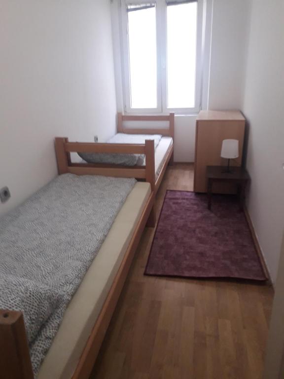 Postel nebo postele na pokoji v ubytování Jasmin
