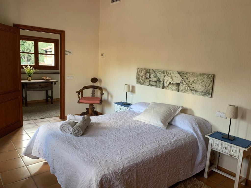 Postel nebo postele na pokoji v ubytování Villa Can Tolo