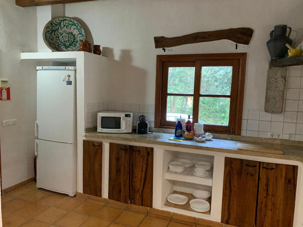 Kuchyň nebo kuchyňský kout v ubytování Villa Can Tolo