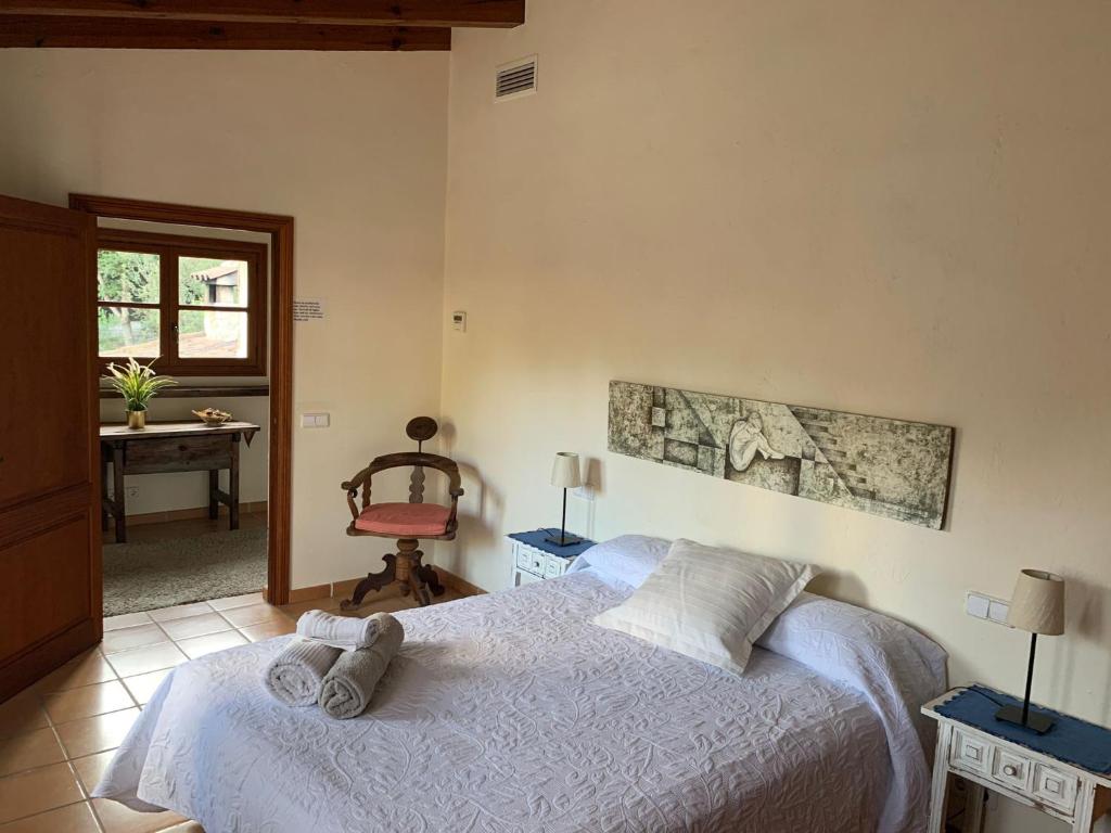Postel nebo postele na pokoji v ubytování Villa Can Tolo