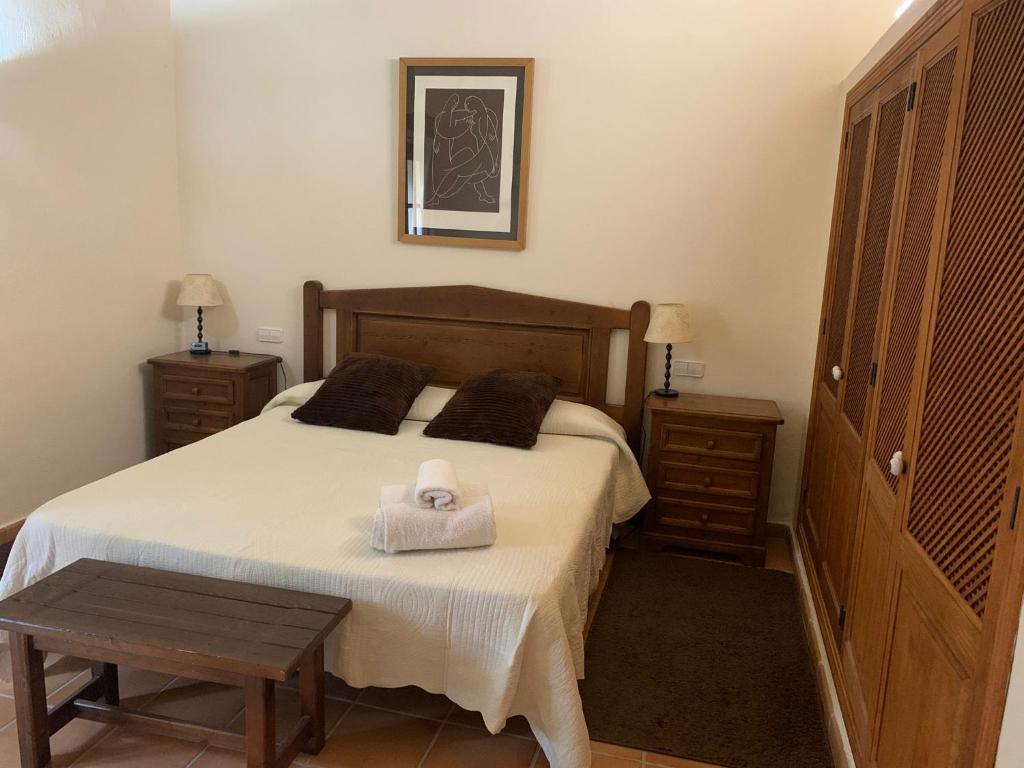 Postel nebo postele na pokoji v ubytování Villa Can Tolo