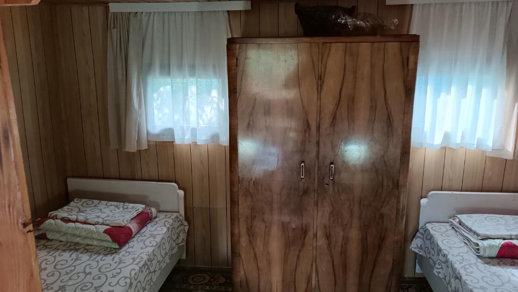 Postel nebo postele na pokoji v ubytování Vikendica Ovčar Banja