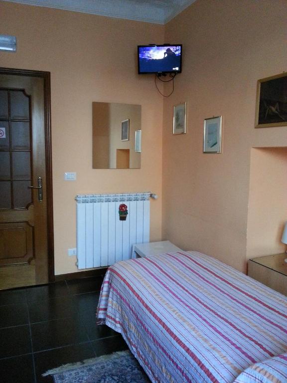 Postel nebo postele na pokoji v ubytování Affittacamere Andronaco
