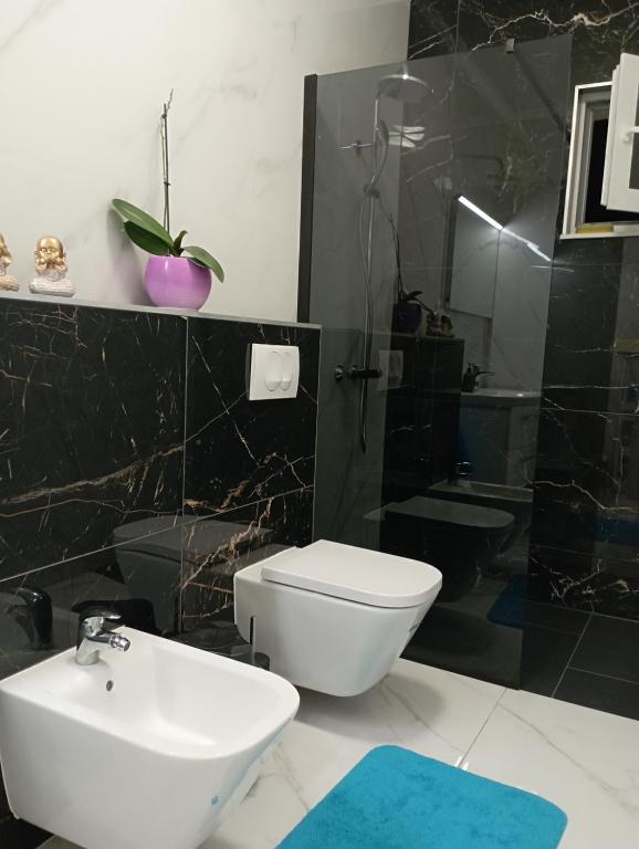 Kúpeľňa v ubytovaní Apartmani Trubi 3