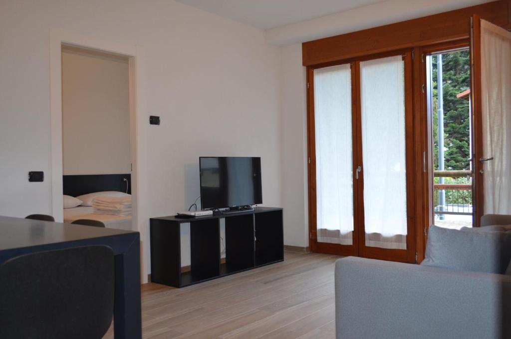 Telewizja i/lub zestaw kina domowego w obiekcie Appartamenti Sky Express