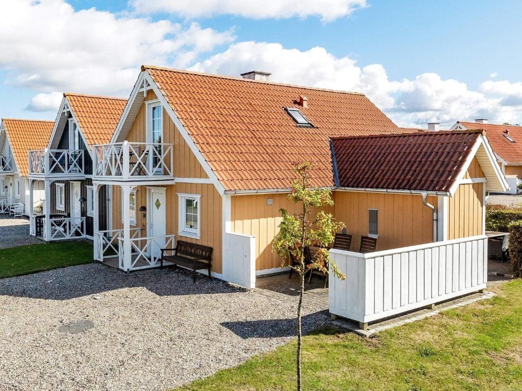 a house with an orange roof at 7 person holiday home in Brenderup Fyn in Bro