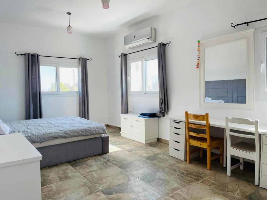 Кровать или кровати в номере Elite Residence Dahab