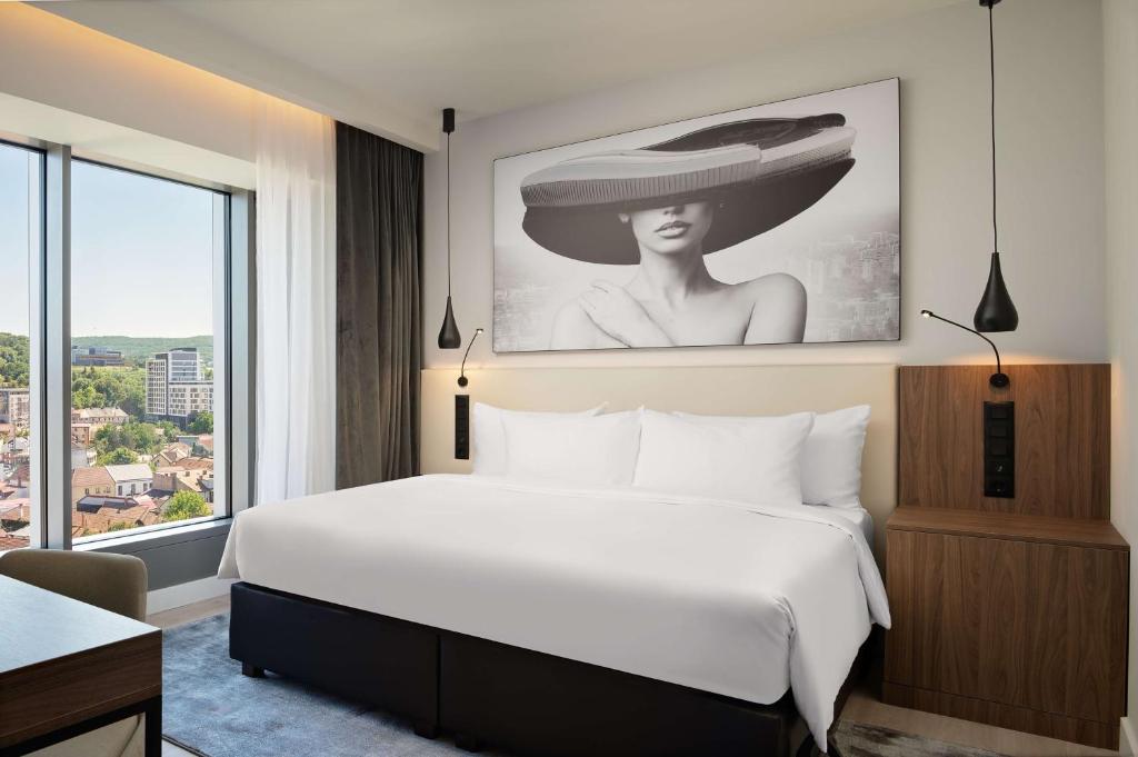 Postel nebo postele na pokoji v ubytování Radisson Blu Hotel, Cluj