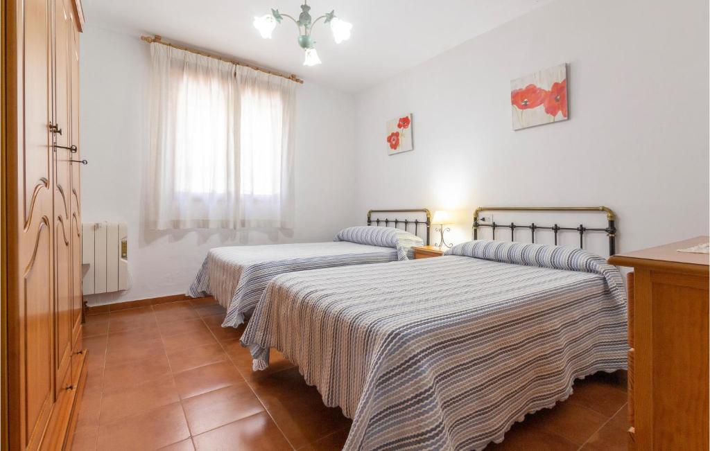 Posteľ alebo postele v izbe v ubytovaní Pet Friendly Home In Padul