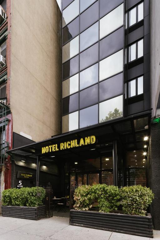a building with a sign for the hotel imperialjad at Hotel Richland LES in New York