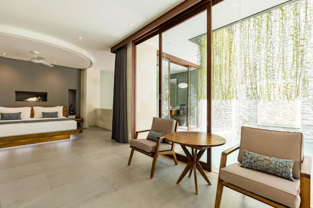 Postel nebo postele na pokoji v ubytování Rama Gaia Villa Ubud