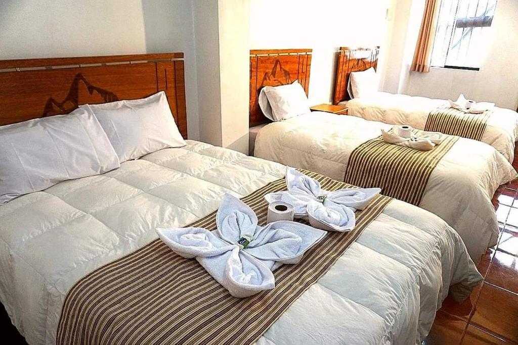 Cama o camas de una habitación en HOTEL- DREAMERS PLACE