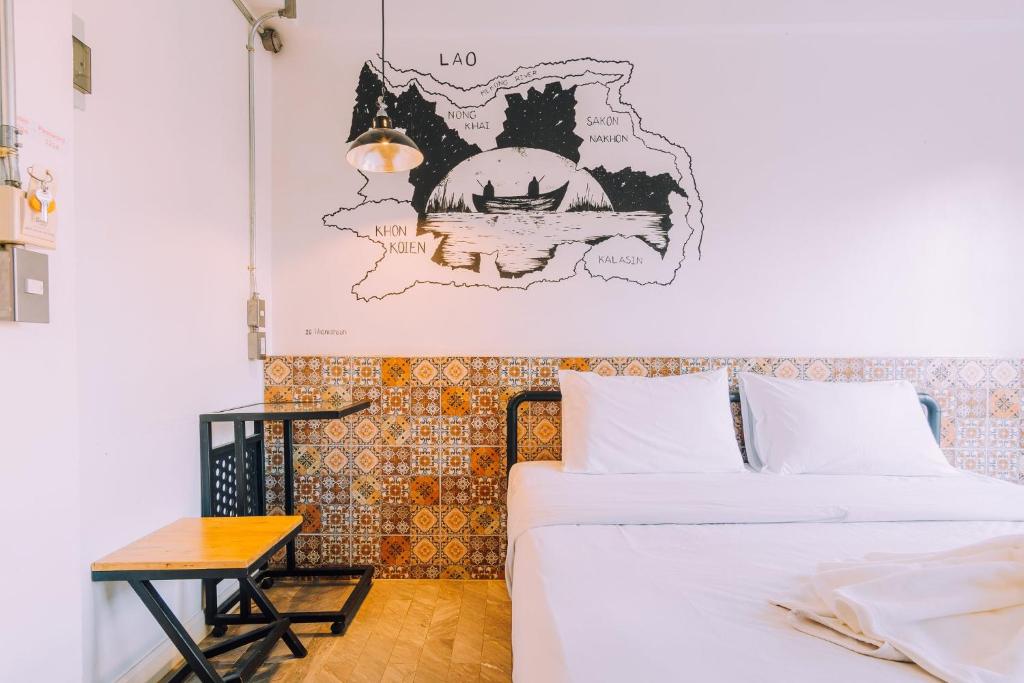 Postel nebo postele na pokoji v ubytování V1 Room Hotel
