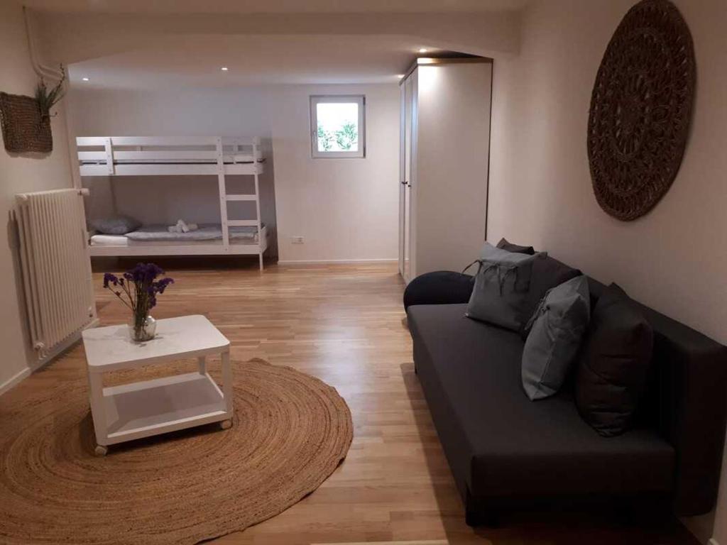 Posezení v ubytování Appartement lumineux et spacieux à Charmey - Coin de paradis