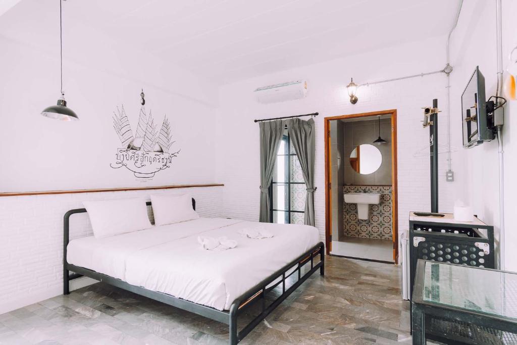 Postel nebo postele na pokoji v ubytování V1 Room Hotel
