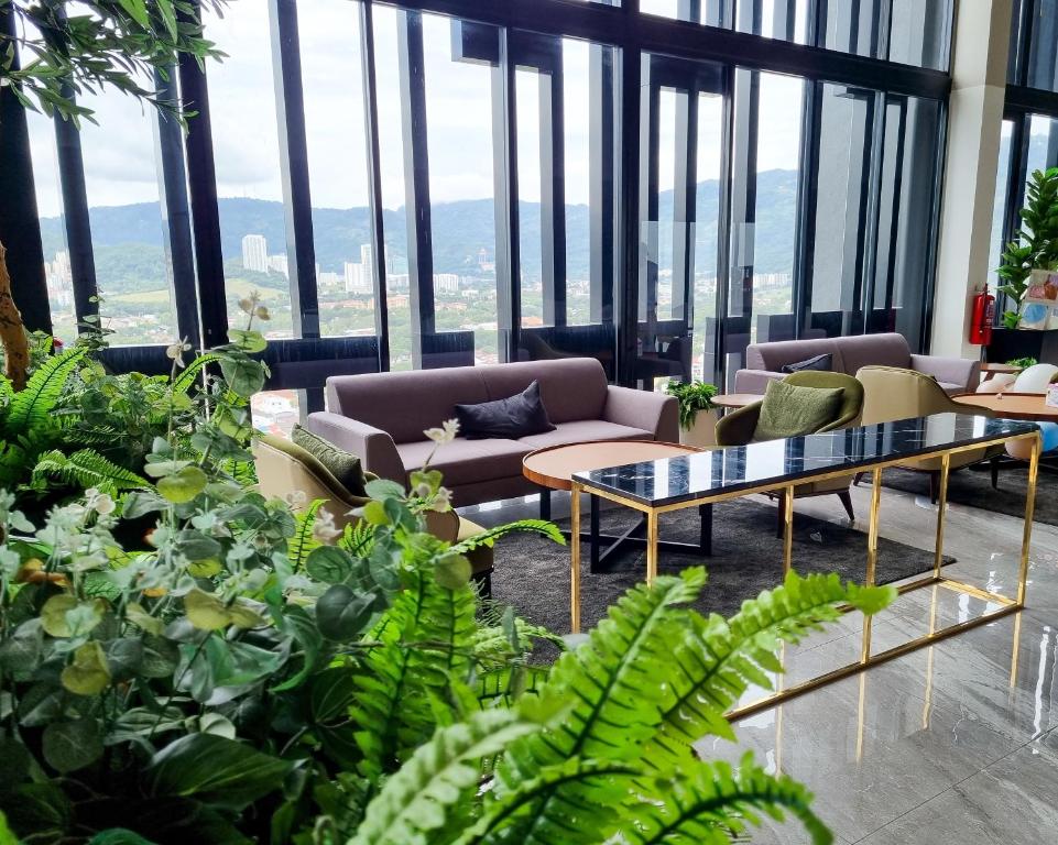 Posezení v ubytování Lavish Beacon Executive Suites by Bin Dao Wu Homestay Penang