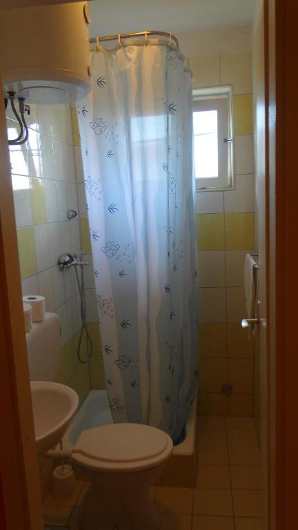 Koupelna v ubytování Apartments Danijela