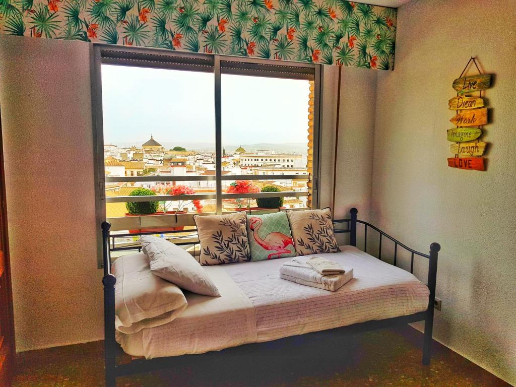 Postel nebo postele na pokoji v ubytování Panorama Córdoba Center, baño privado externo a la habitación