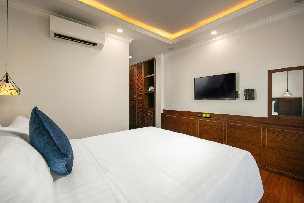 TV a/nebo společenská místnost v ubytování Hanoi Vacanza Premier Hotel