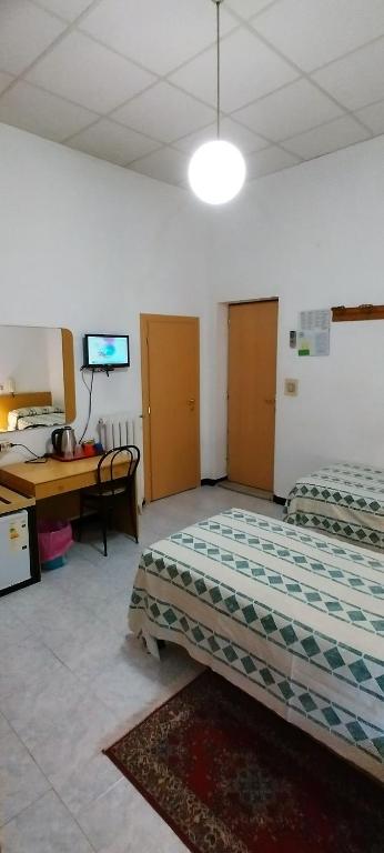 Postel nebo postele na pokoji v ubytování Hotel Major