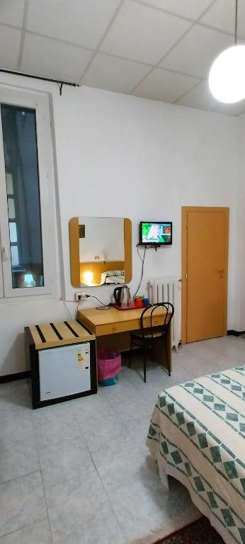 Postel nebo postele na pokoji v ubytování Hotel Major