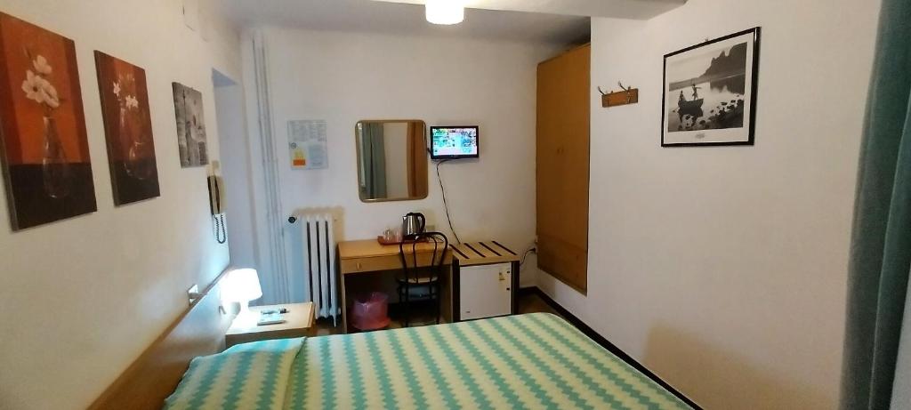 Postel nebo postele na pokoji v ubytování Hotel Major