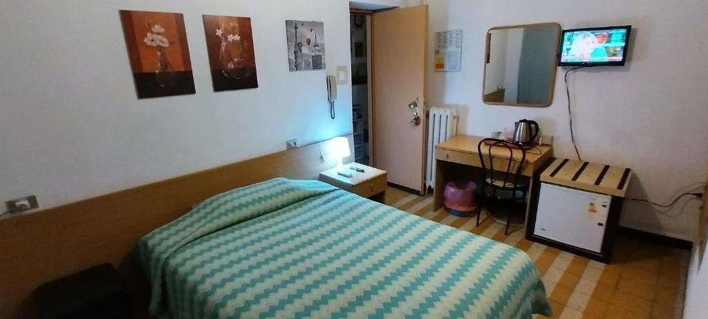 Postel nebo postele na pokoji v ubytování Hotel Major
