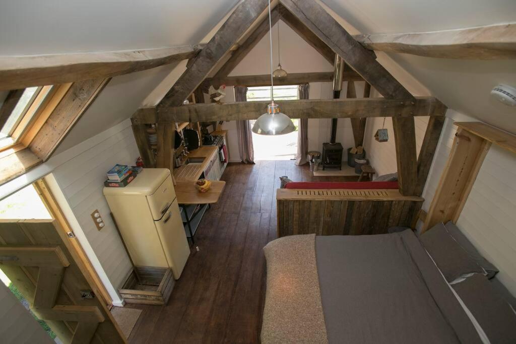 an overhead view of a kitchen in an attic at Sky Cabin. Cosy Forest Log Cabin 3 night minimum in Wareham
