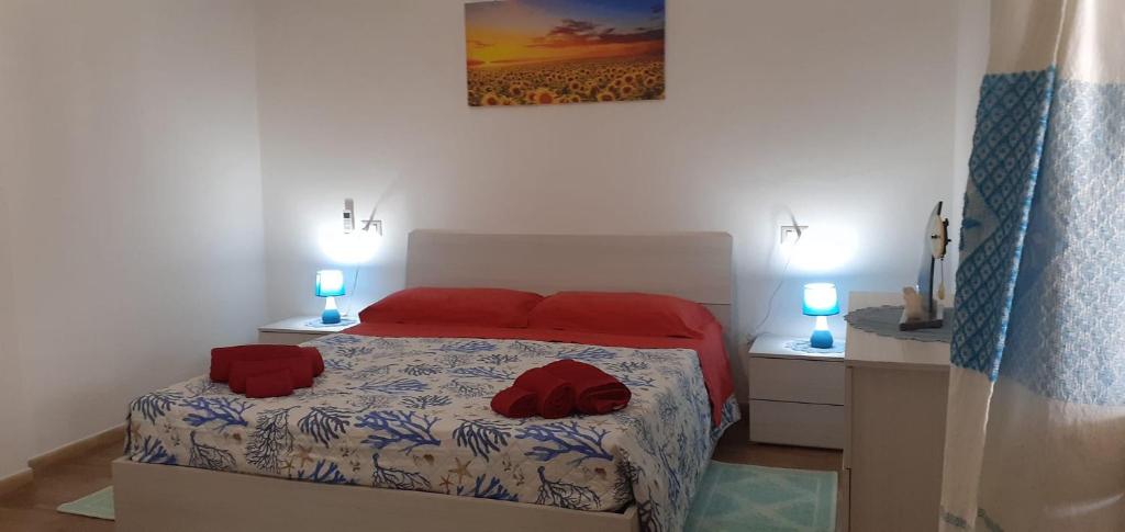 Voodi või voodid majutusasutuse Adorabile appartamento con vista panoramica toas