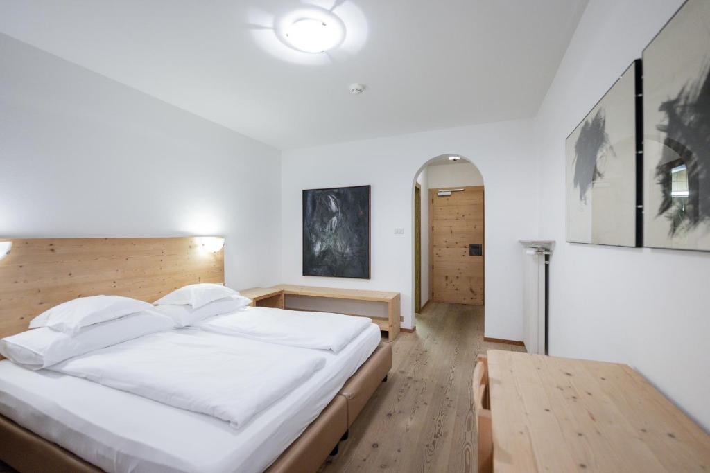 Postel nebo postele na pokoji v ubytování Rooms Kronblick