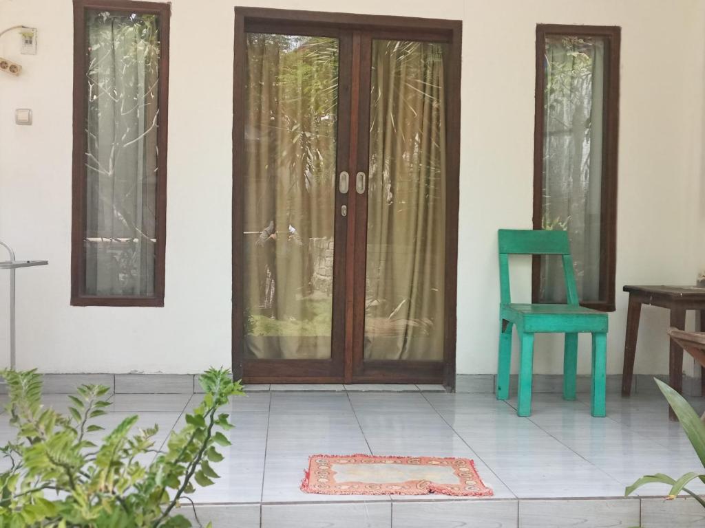 Patio nebo venkovní prostory v ubytování BUKIT GARDEN Guest House