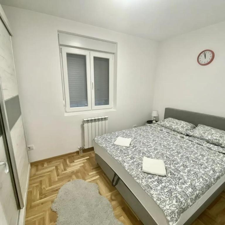 Postel nebo postele na pokoji v ubytování BellaVista apartman