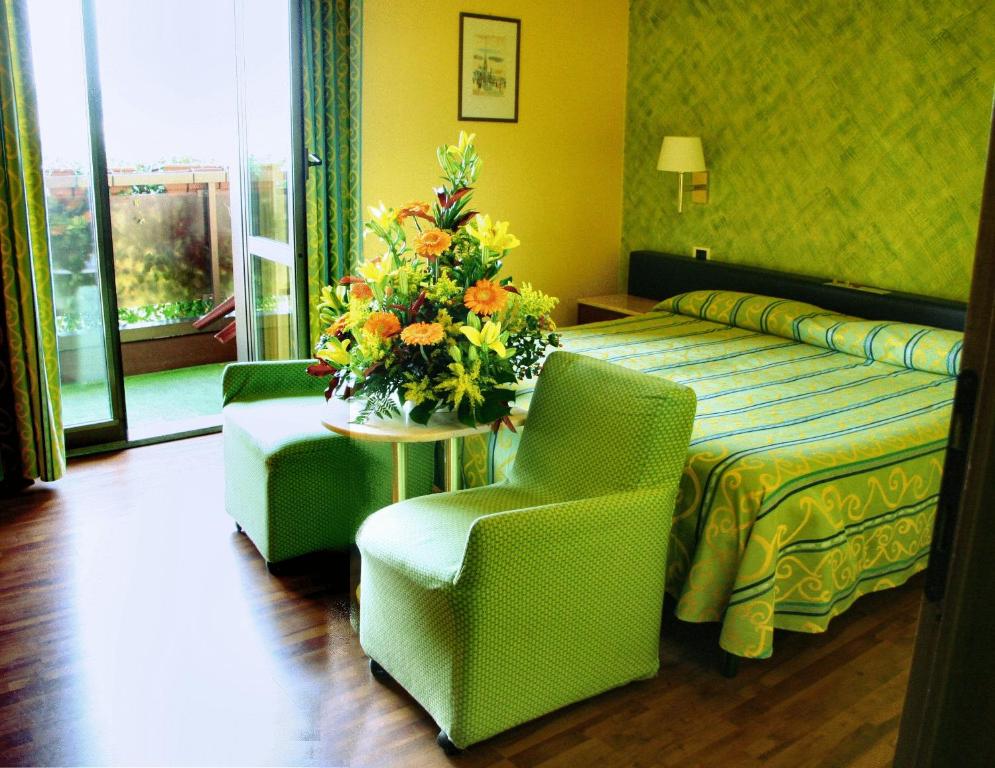Postel nebo postele na pokoji v ubytování Hotel Atlantic