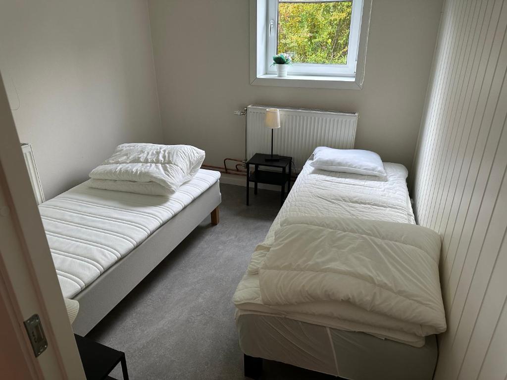 Postel nebo postele na pokoji v ubytování Lärkan21 Tvisegatan 24C