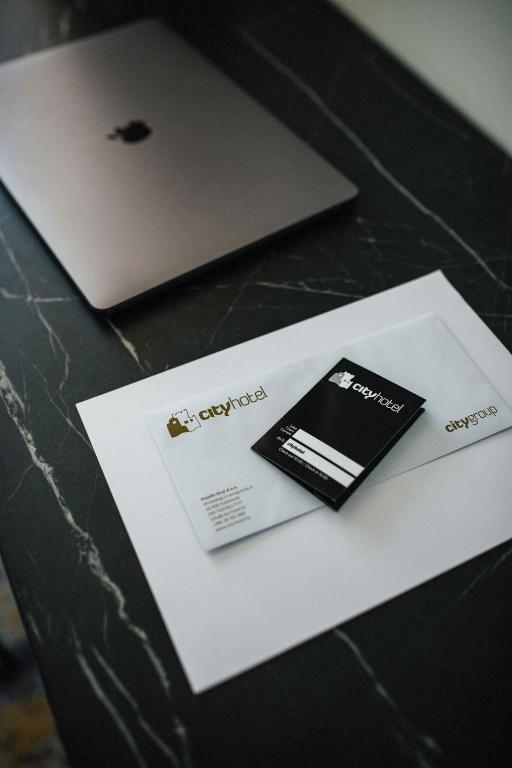 a piece of paper sitting on top of a table at City Hotel Dubrovnik in Dubrovnik