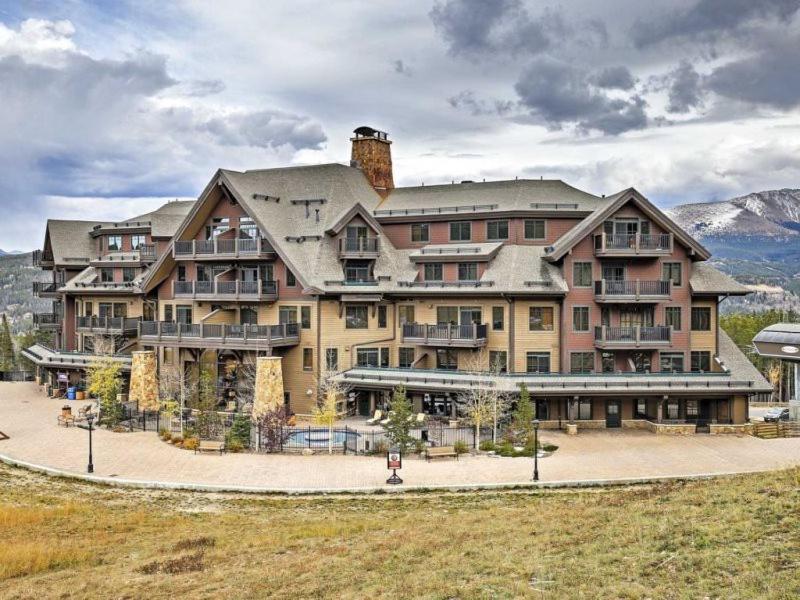 a large apartment building with a large at Crystal Peak Lodge 3 Bedroom Ski In, Ski Out Slopeside Condo At The Base Of Peak 7 in Breckenridge