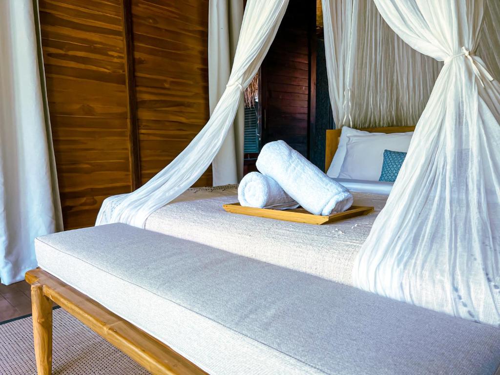 Postel nebo postele na pokoji v ubytování ONAYA Bali Resort - Adults Only