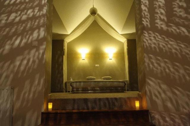 Voodi või voodid majutusasutuse B&B Espace Tello toas